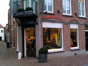 Vervangen glas door gelaagd zonwerend glas luxe kledingzaak Amersfoort